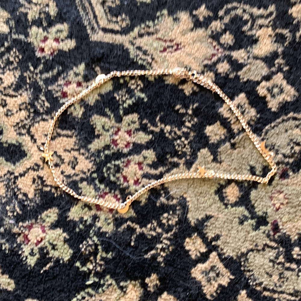 Lightly used gold moon and stars necklace